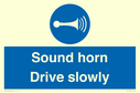 sound-horn-drive-slowly-warehousing-and-delivery-sign~